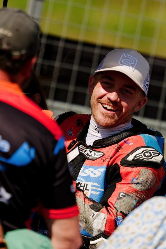 Paddock: rider smiling in the paddock, 2026