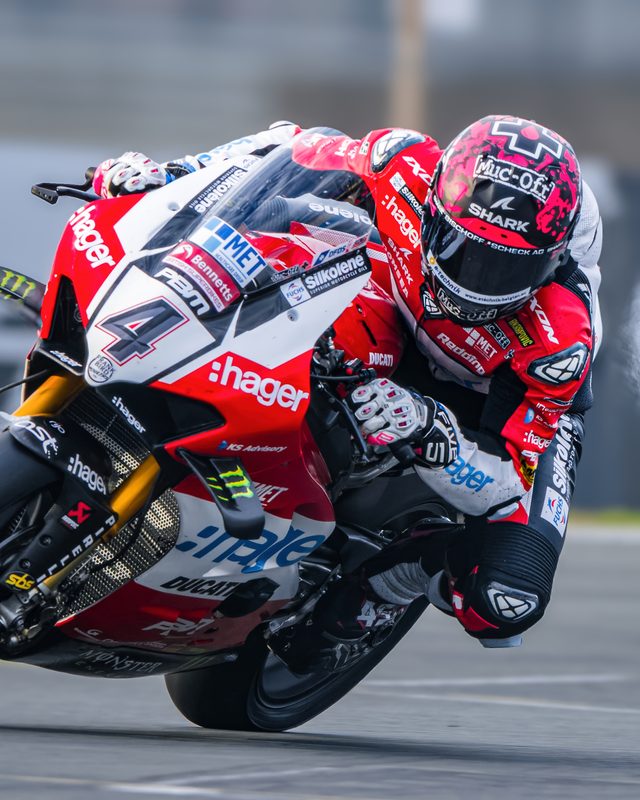Superbike racing: Scott Redding on the No. 4 Hager PBM Ducati, knee down, Assen 2025