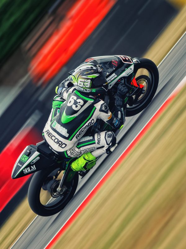 Moto4 racing: Jack Dunabie on the No. 63 bike, panned, Snetterton 2026