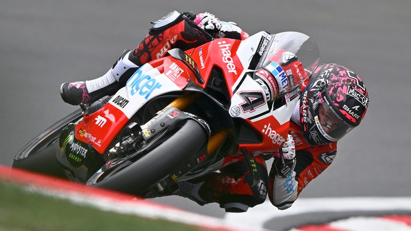Award-winning image: rider at full lean on the No. 4 Hager PBM Ducati, 2025